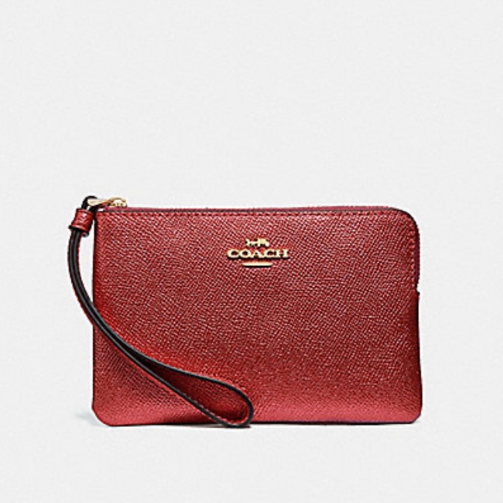 COACH CORNER ZIP WRISTLET (F21070)
METALLIC CURRANT/LIGHT GOLD